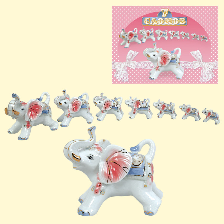 Набор статуэток 7 слонов розовый, из порцелана, высота фигурок от 3 см до 9 см фото 1 — Интернет каталог PriceOK
